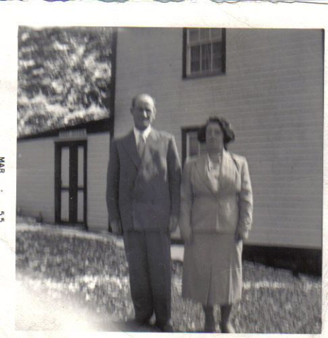 02 Arthur and Winnie Hamilton by their house in Isle Valen in March 1955. Winnie ran the Post Office in the back of their house. Credit: Madonna (Lockyer) Drover